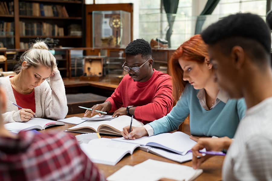 group of university students studying together